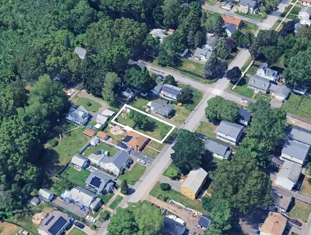 an aerial view of a city with lots of residential buildings