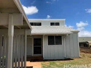 a view of house with yard