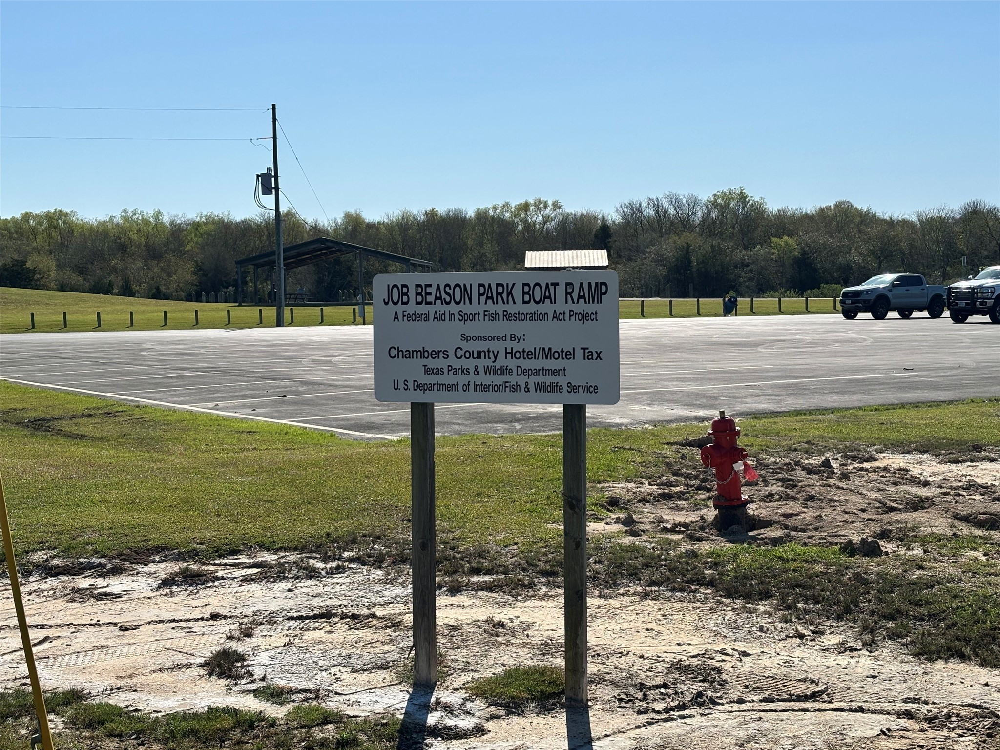 608 Neirbo Street Anahuac, TX 77514 - Photo 5 of 5 a view of a garden from a patio