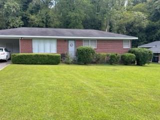 116 Atteiram Drive Rome, GA 30161 - Photo 1 of 1 a view of a brick house with a yard plants and large tree