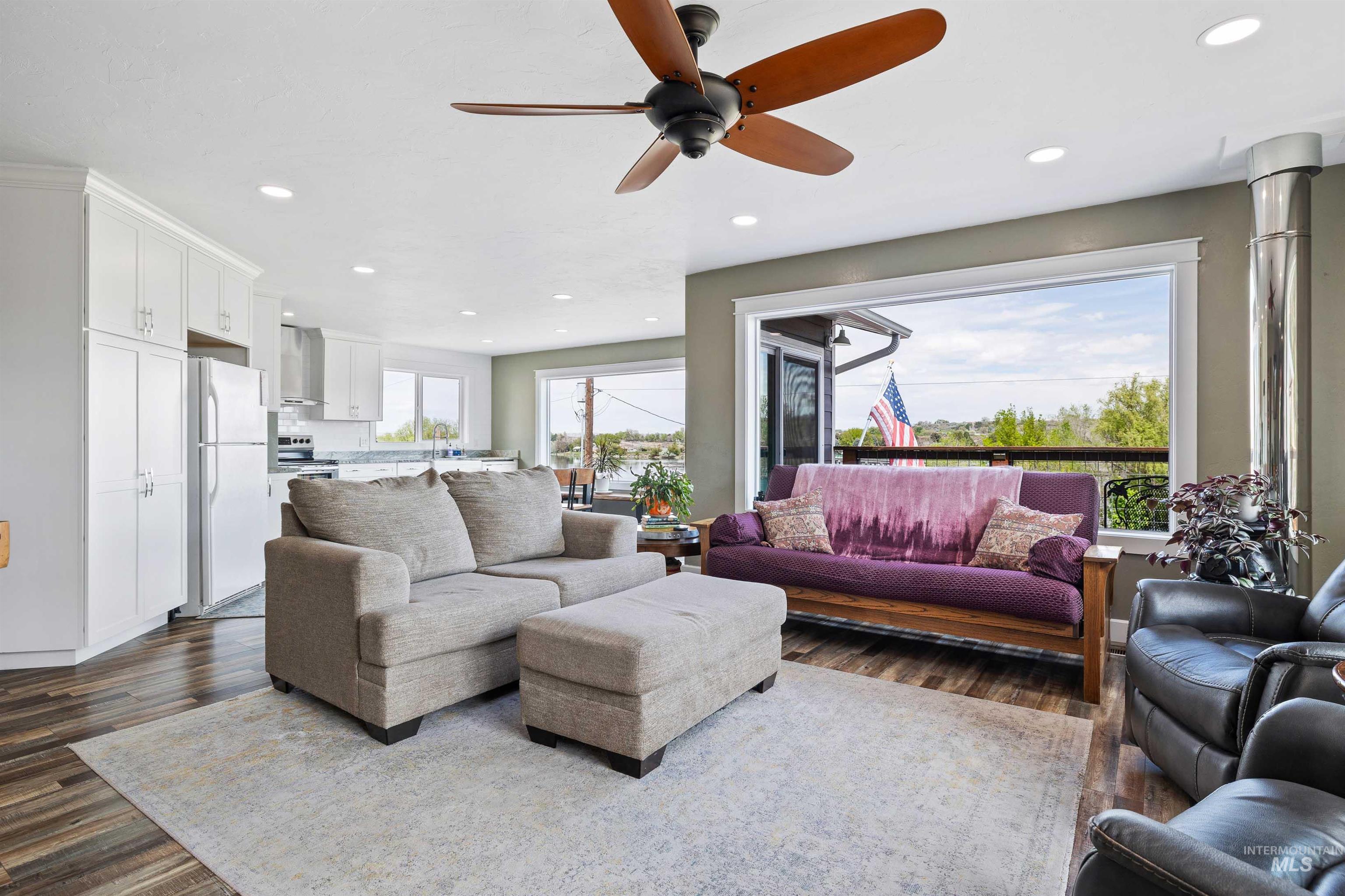 11 Bell Rapids Road Hagerman, ID 83332 - Photo 16 of 40 Open-concept living space featuring wood-finish flooring, recessed lighting, and a ceiling fan