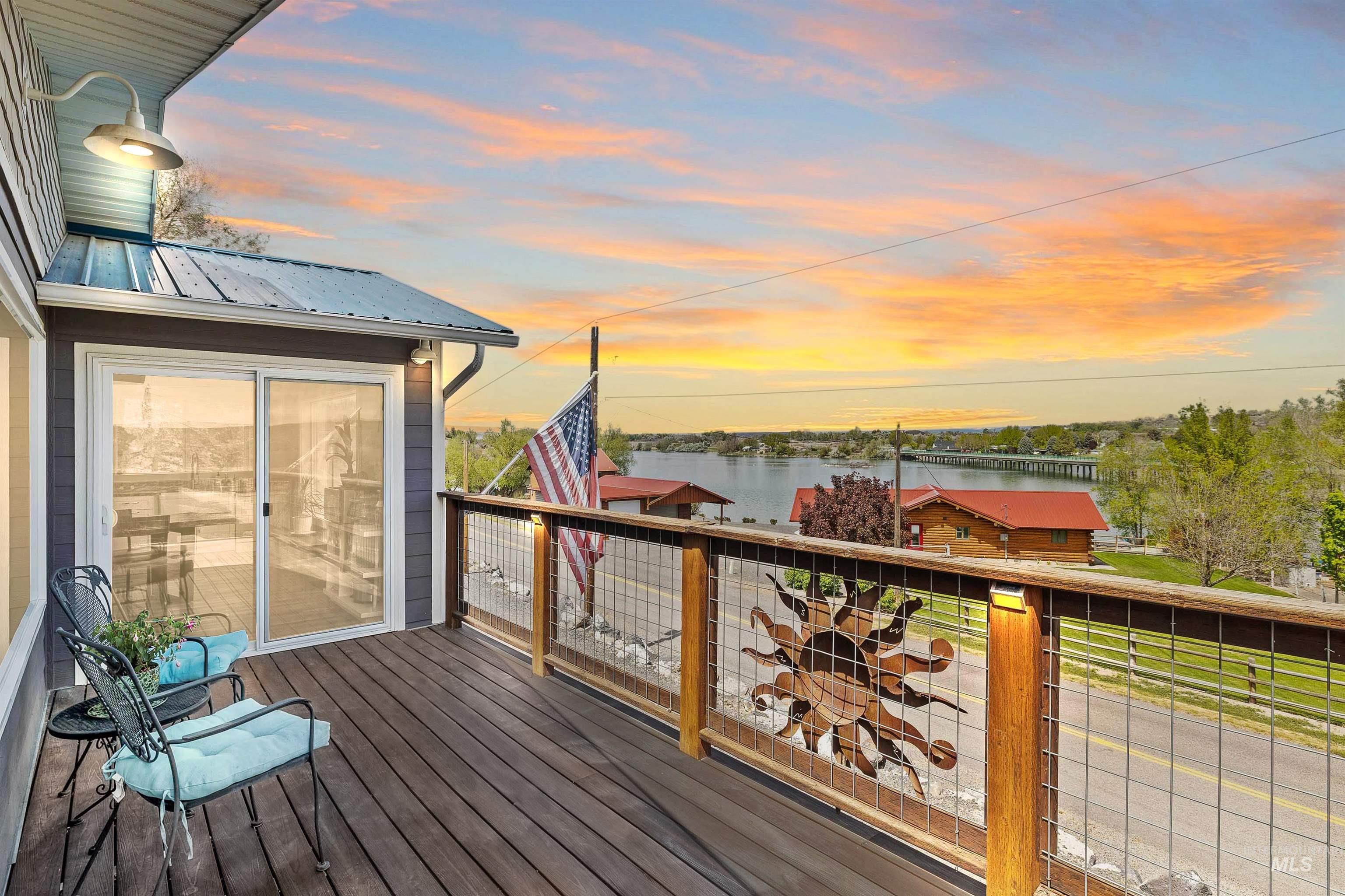 11 Bell Rapids Road Hagerman, ID 83332 - Photo 5 of 40 Spacious outdoor deck featuring wood-finish flooring and a metal railing system