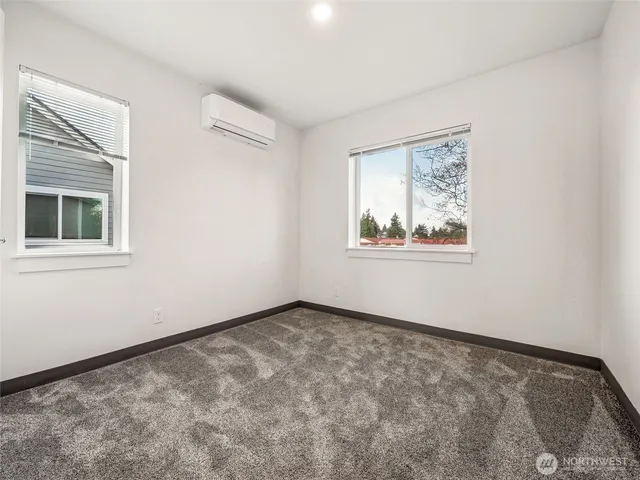 a view of a back yard from a corridor