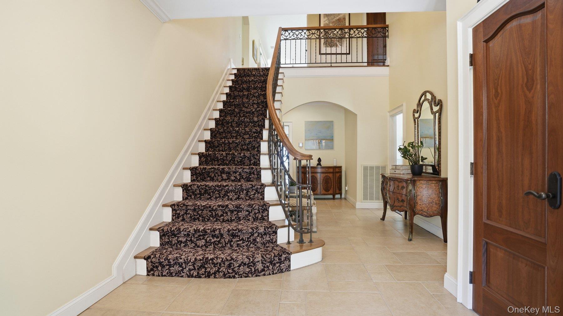 3172 Sound Avenue Baiting Hollow, NY 11901 - Photo 11 of 50 Entrance Foyer and Stairs to 2nd Floor