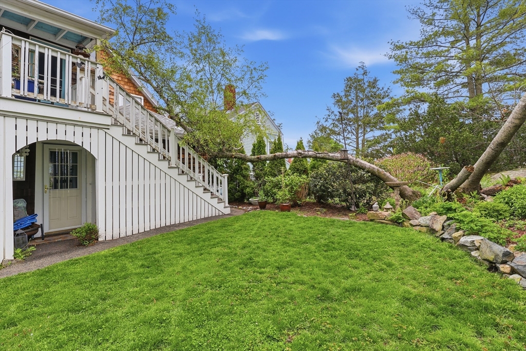 16 Evans Road, Unit 2 Marblehead, MA 01945 - Photo 23 of 24 a view of a garden from a balcony