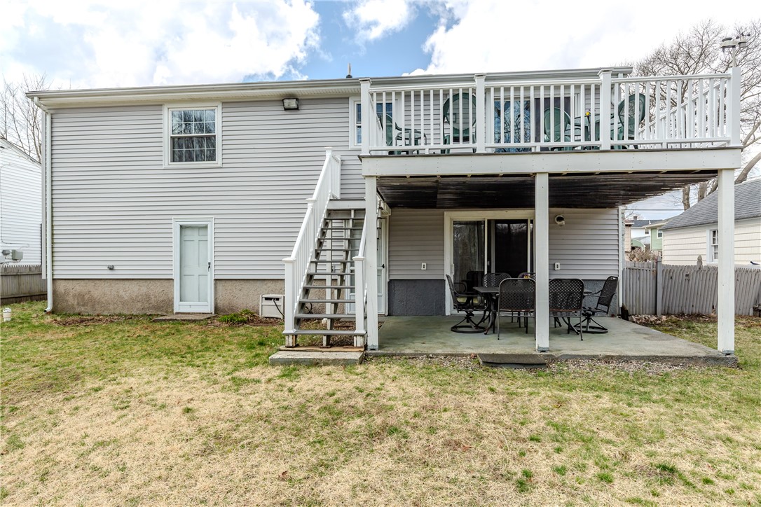 185 Parkside Avenue Pawtucket, RI 02861 - Photo 22 of 31 Exterior rear with deck and patio