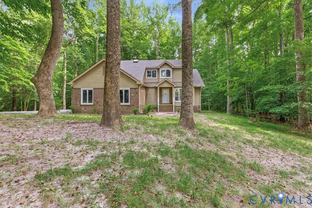 4099 Doe Run Road Hopewell, VA 23860 - Photo 4 of 36 Two-story residence featuring a combination of bri