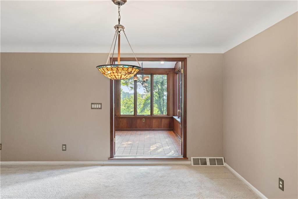 33 Roxbury Road Pittsburgh, PA 15221 - Photo 9 of 28 Sunroom entry from dining room