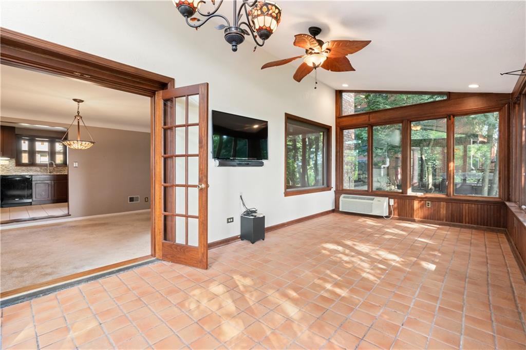 33 Roxbury Road Pittsburgh, PA 15221 - Photo 10 of 28 View of kitchen & dining room from sun room