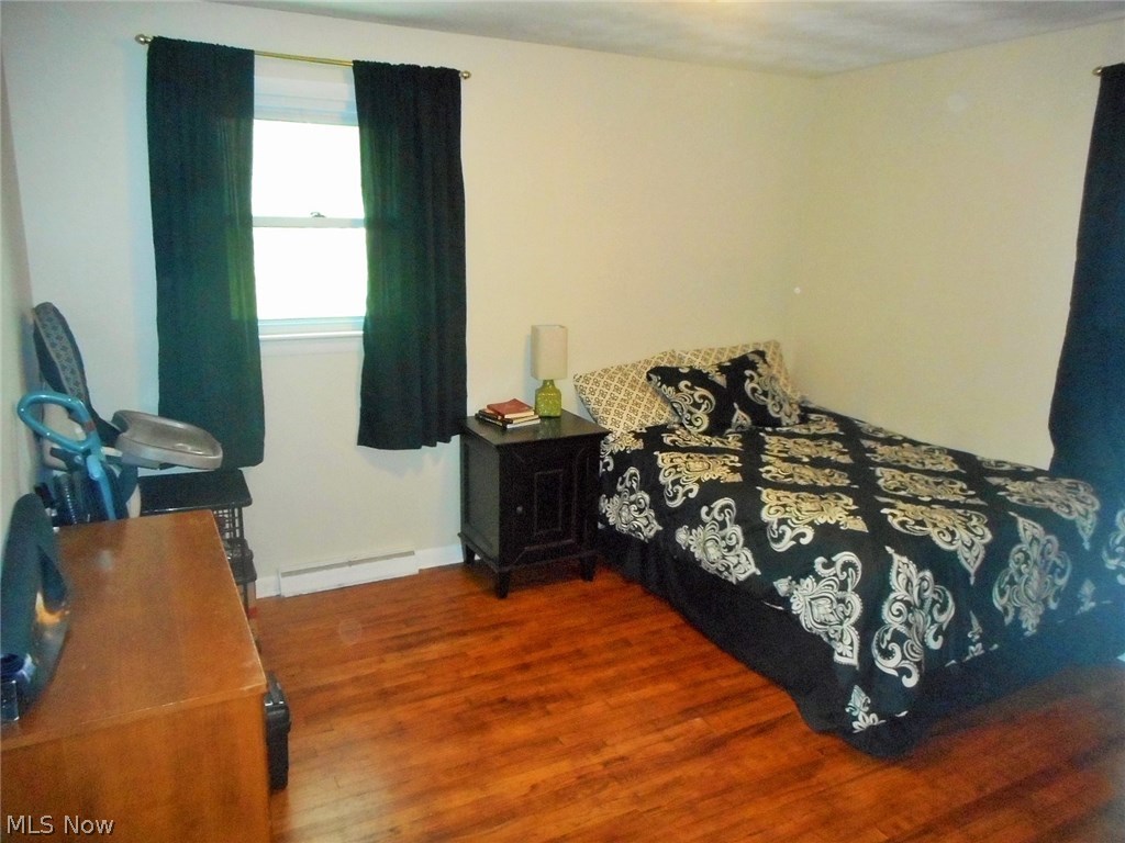 658 Garnette Road Akron, OH 44313 - Photo 14 of 24 The third bedroom in the house, also with full closet and refinished wood flooring.Everything in this home is nice and neutral.