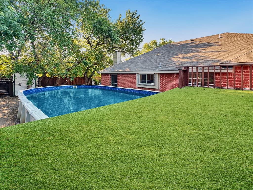 806 Glenwood Court McKinney, TX 75071 - Photo 16 of 29 a view of a house with a backyard