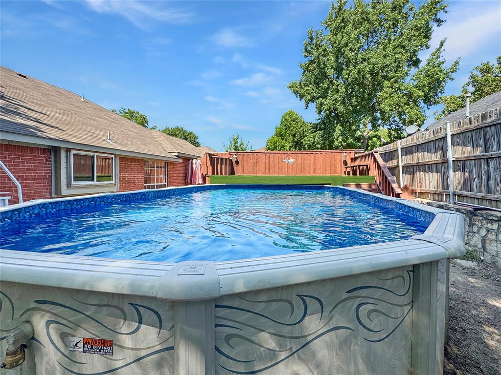 806 Glenwood Court McKinney, TX 75071 - Photo 17 of 29 a view of roof deck with wooden floor