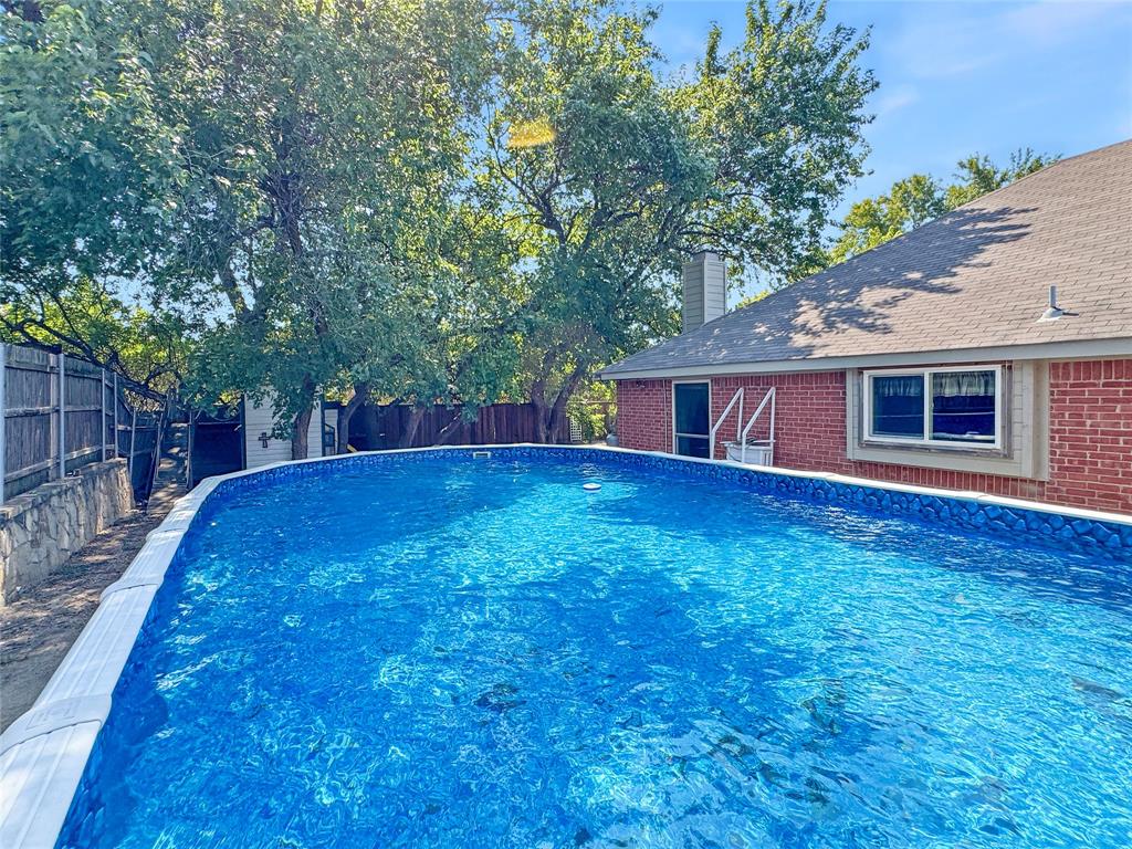 806 Glenwood Court McKinney, TX 75071 - Photo 2 of 29 a view of a house with a backyard