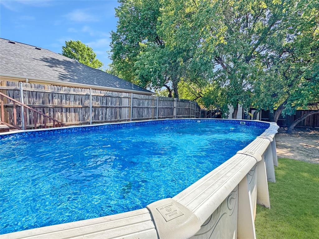 806 Glenwood Court McKinney, TX 75071 - Photo 23 of 29 a view of a backyard with a small cabin