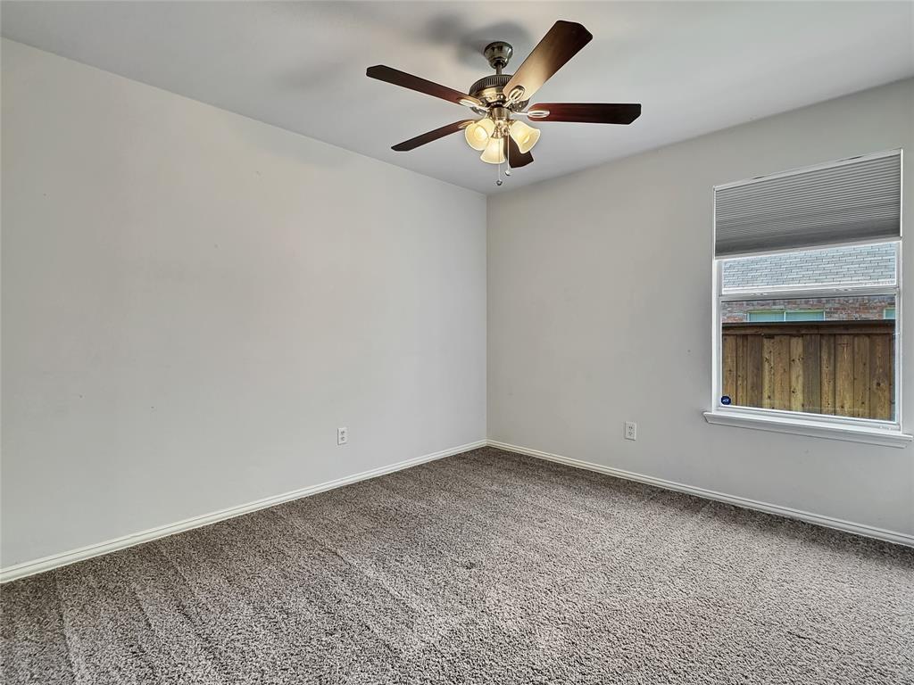 806 Glenwood Court McKinney, TX 75071 - Photo 24 of 29 an empty room with a window