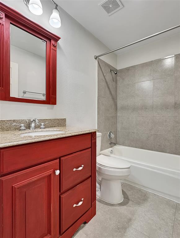 806 Glenwood Court McKinney, TX 75071 - Photo 25 of 29 a bathroom with a bathtub shower sink mirror and toilet