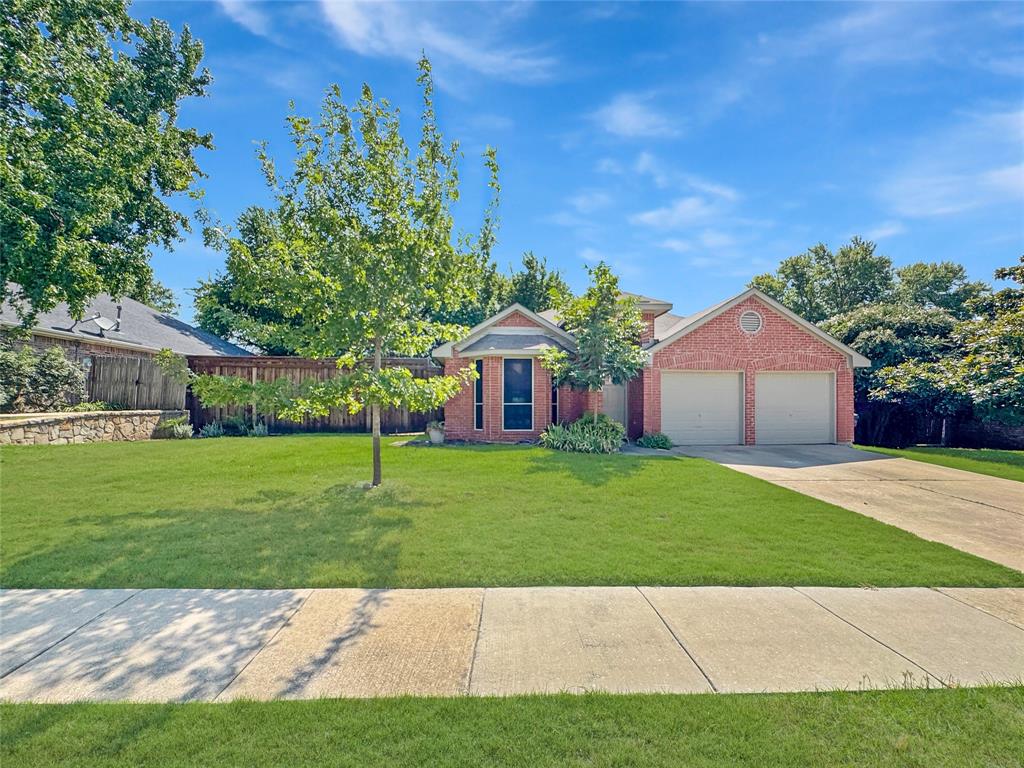 806 Glenwood Court McKinney, TX 75071 - Photo 29 of 29 a view of an house with backyard space and garden