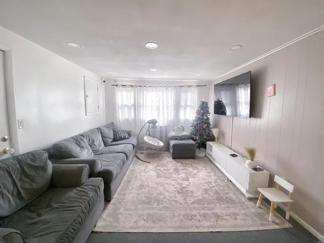 a living room with furniture and a couch