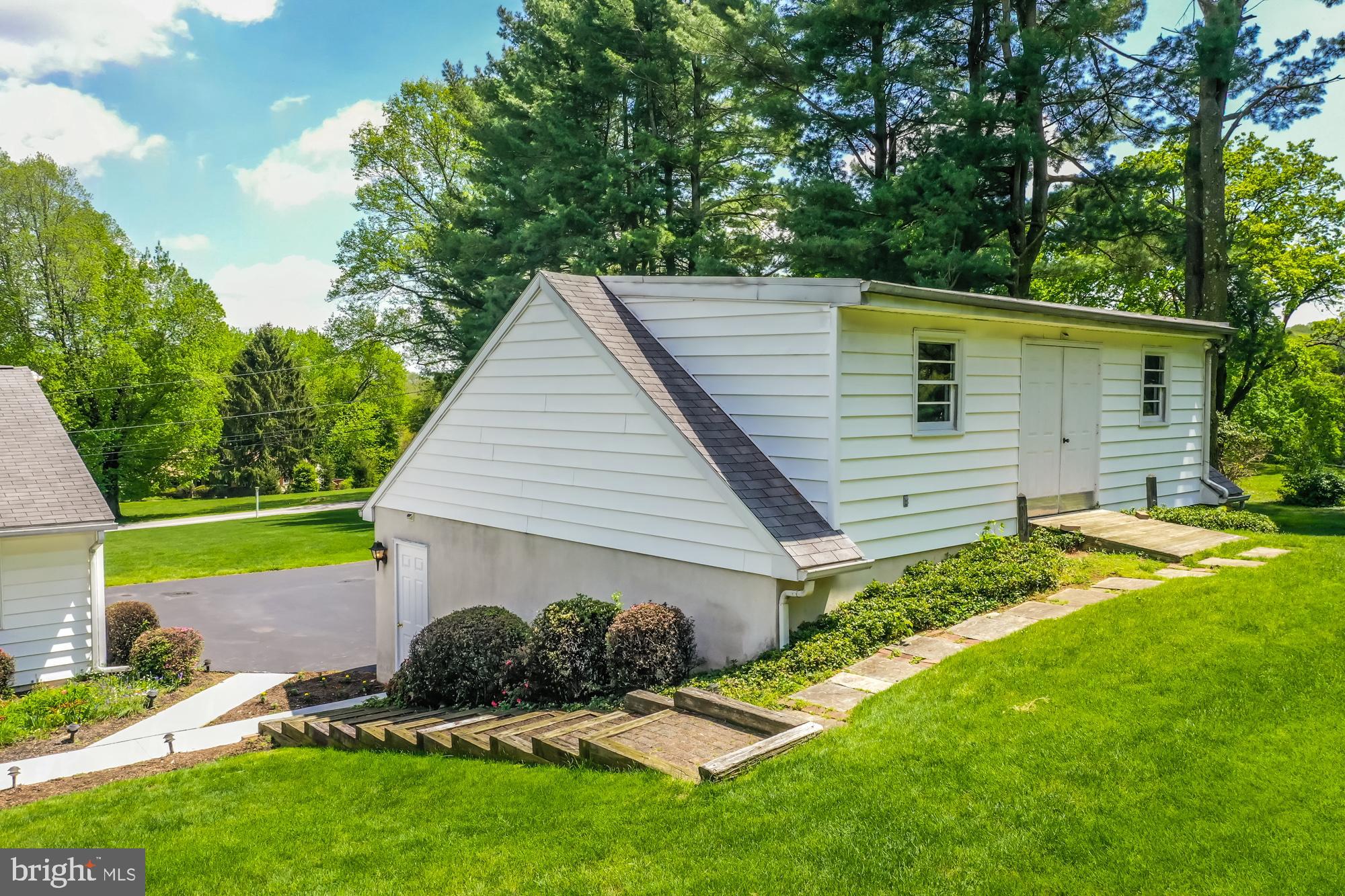 102 Grandview Road Downingtown, PA 19335 - Photo 5 of 43 rear entry to upper level garage, workshop/storage