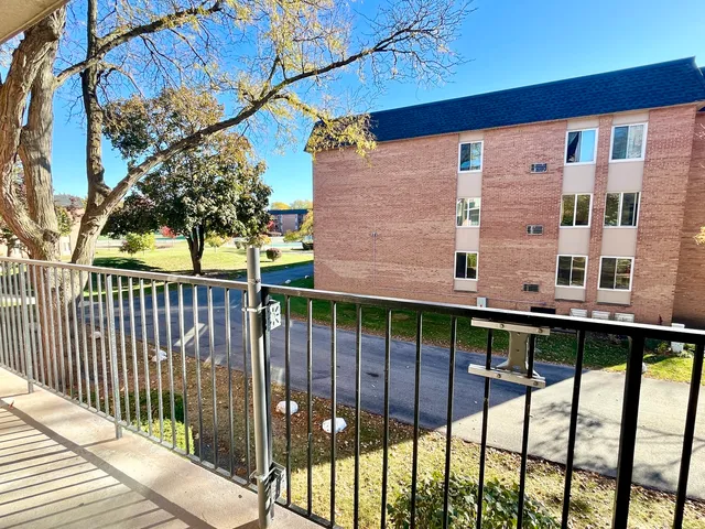a view of a building from a balcony