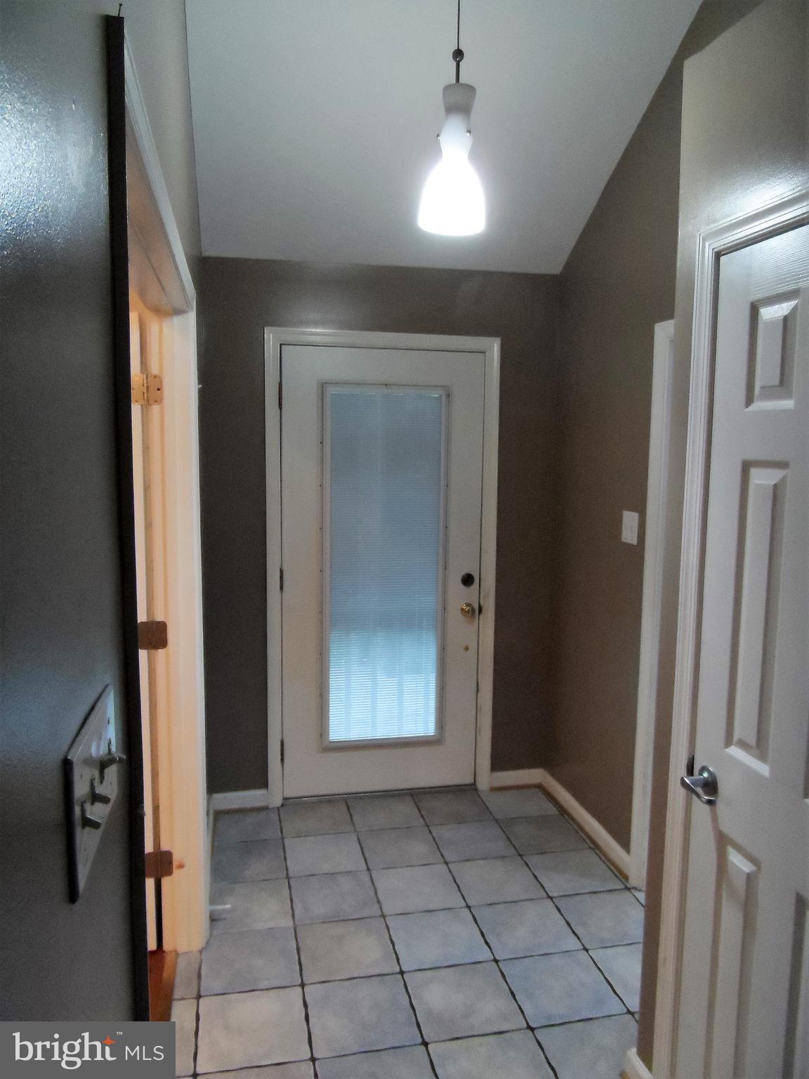 562 Riverside Drive Pasadena, MD 21122 - Photo 5 of 18 Ceramic Foyer
