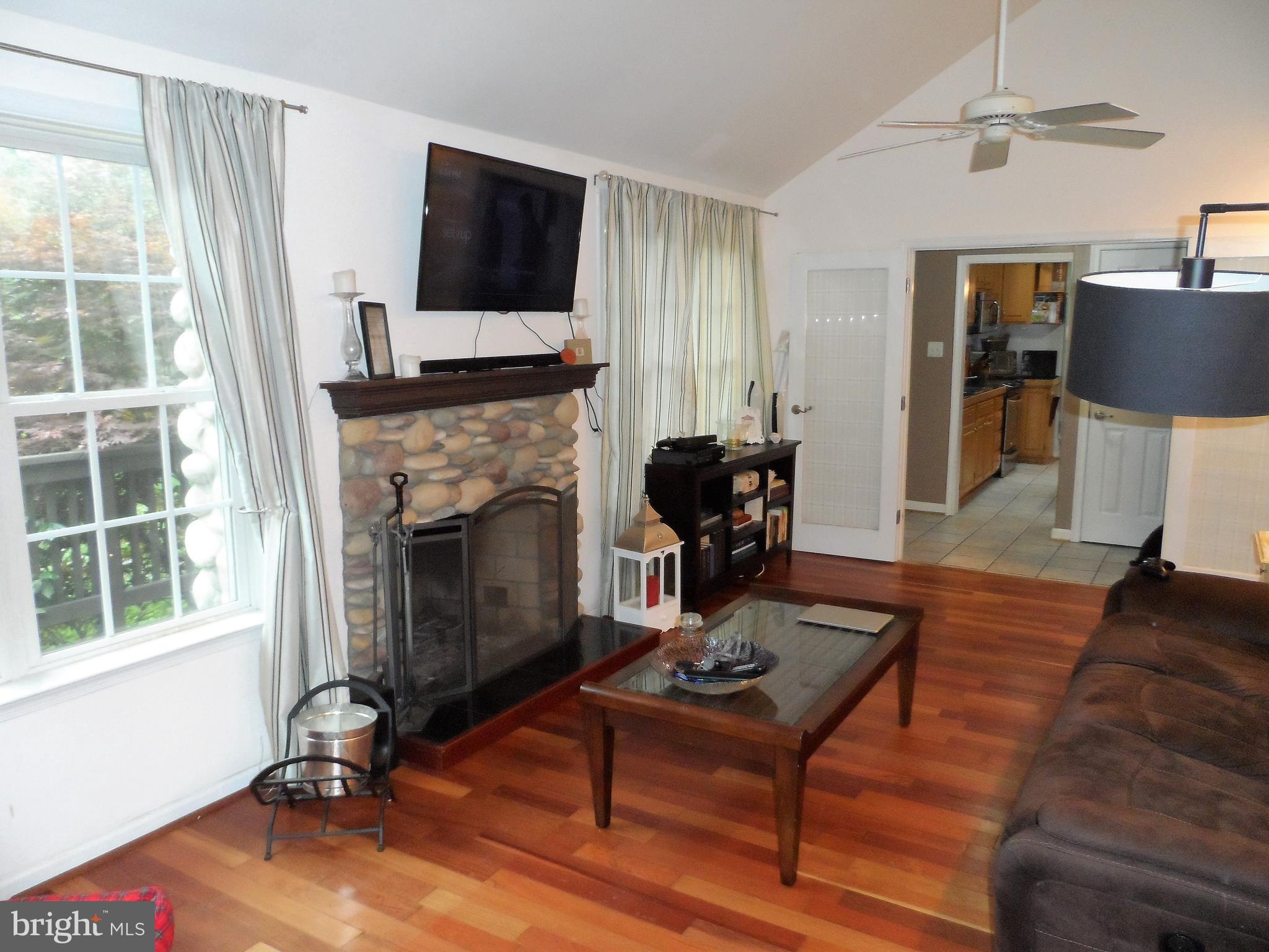 562 Riverside Drive Pasadena, MD 21122 - Photo 7 of 18 Family Room w/Stone Fireplace