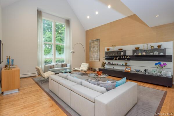 19 West Gate Road Suffern, NY 10901 - Photo 13 of 42 Sunken Living with Cathedral ceilings and panoramic window