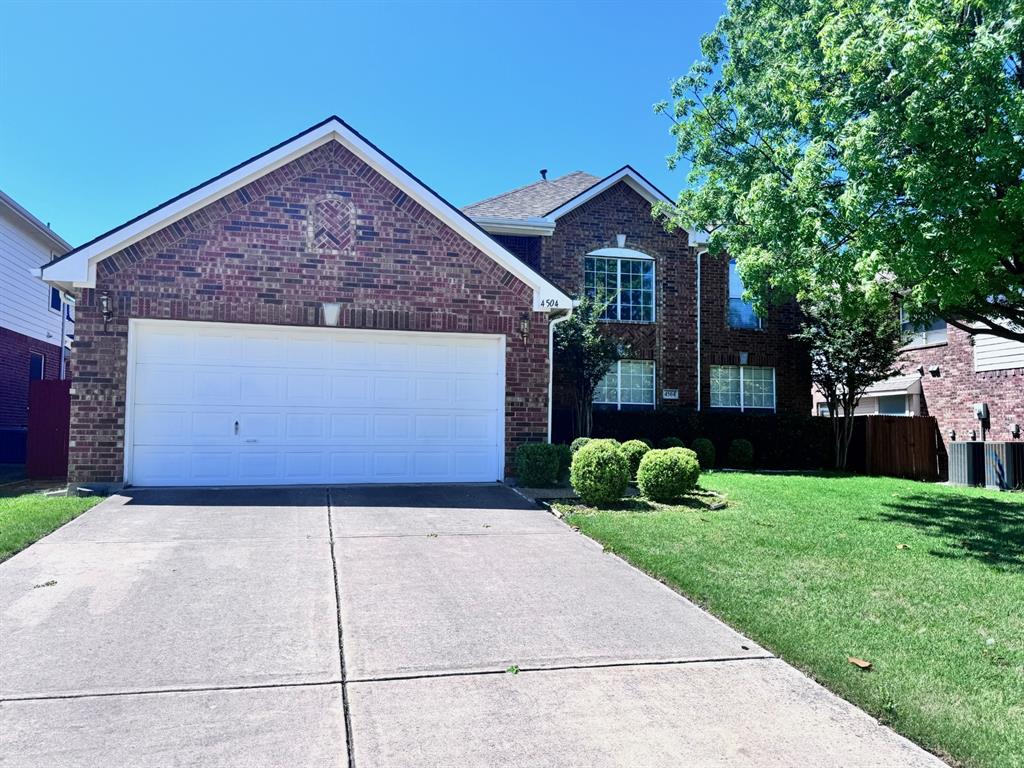 4504 Hawkhurst Drive Plano, TX 75024 - Photo 1 of 1 a front view of a house with garden