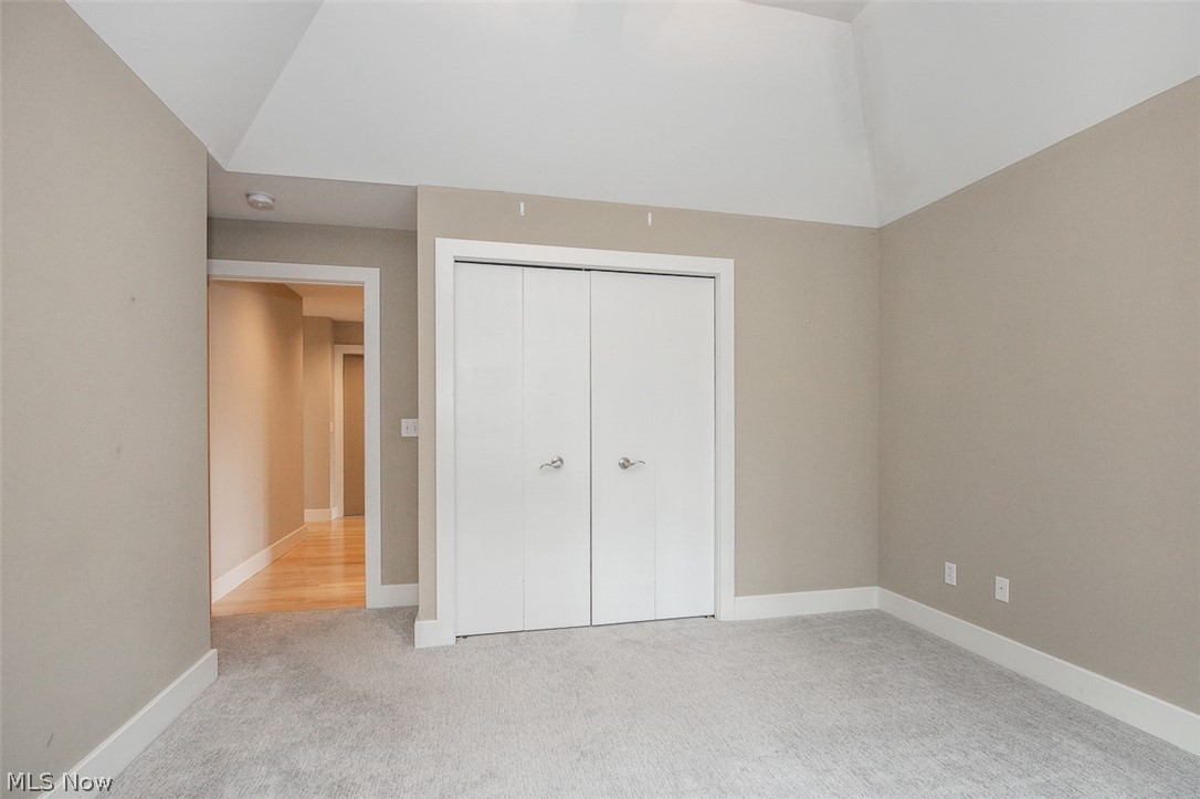 7282 Holzhauer Road Northfield, OH 44067 - Photo 24 of 47 Second guest bedroom with vaulted ceiling