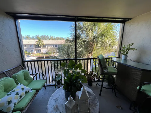 a view of a porch with furniture