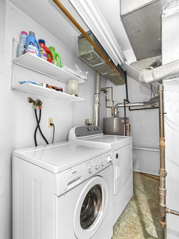 600 County Street, Unit 404 Taunton, MA 02780 - Photo 19 of 26 a utility room with dryer and washer