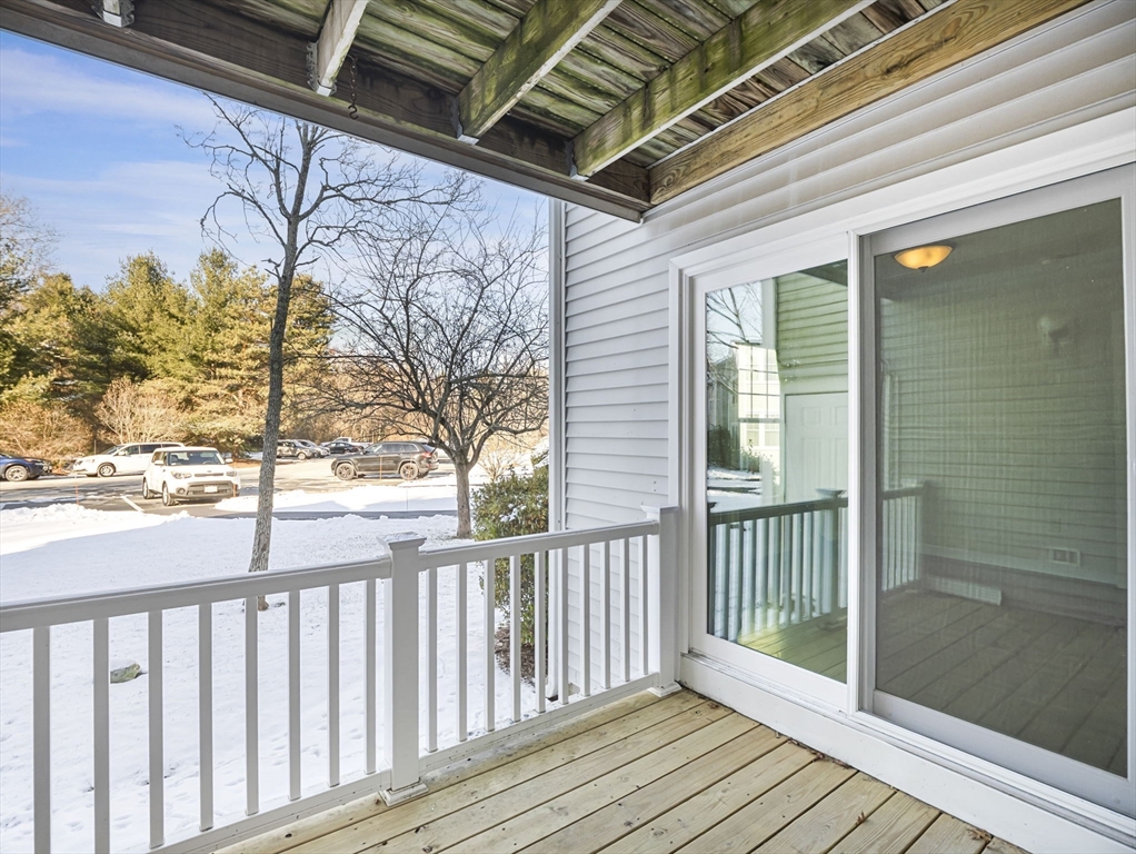 600 County Street, Unit 404 Taunton, MA 02780 - Photo 20 of 26 a view of wooden balcony