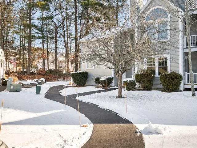 a view of a backyard of the house