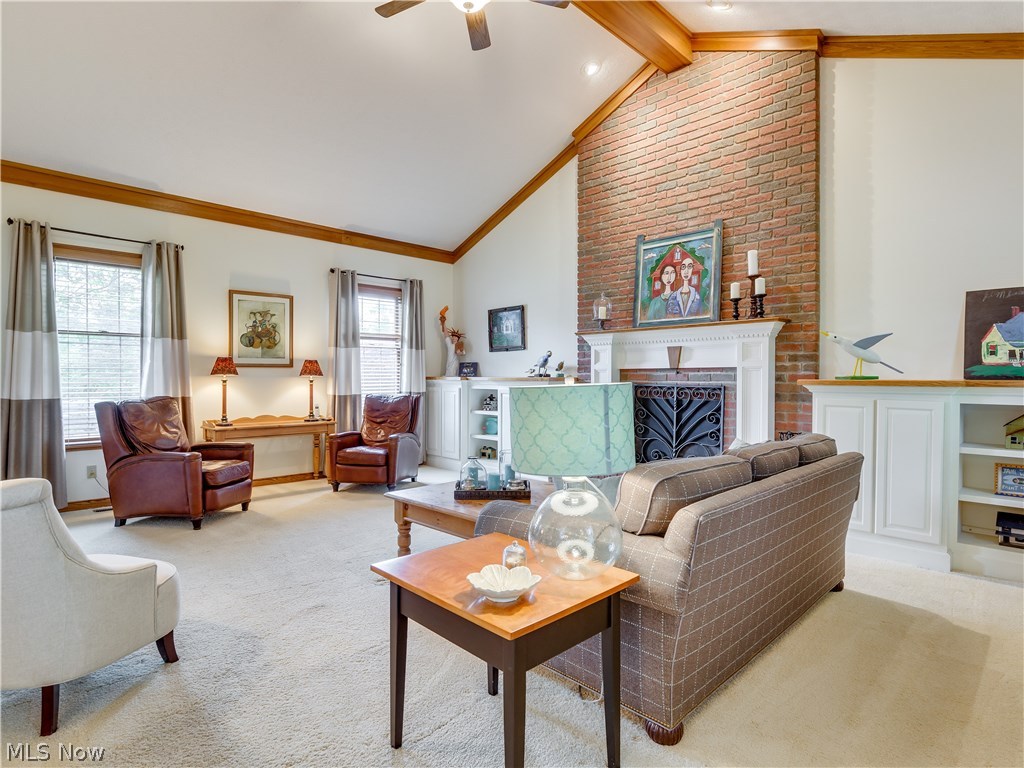 876 Hunter Ridge Circle Fairlawn, OH 44333 - Photo 10 of 35 Plenty of room to gather friends and family in the vaulted ceiling Family Room with built-ins surrounding the stunning fireplace