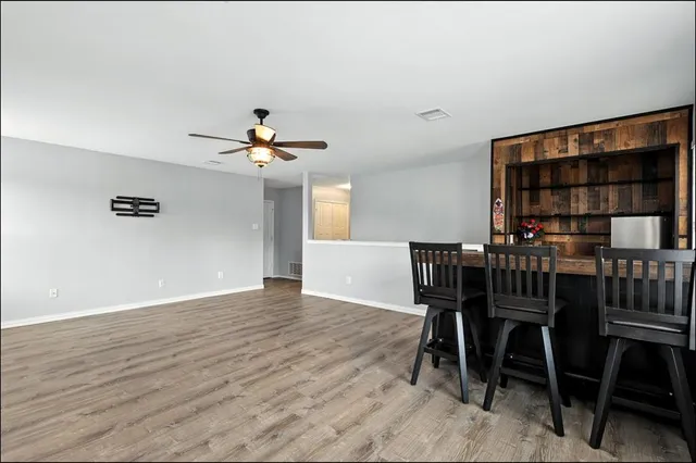 a view of a dining room with furniture