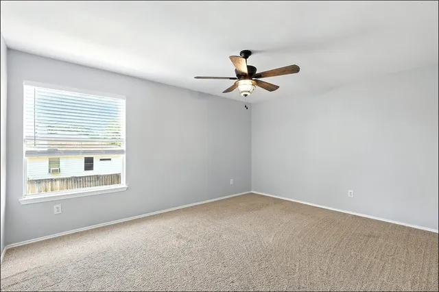 a view of a big room with carpet
