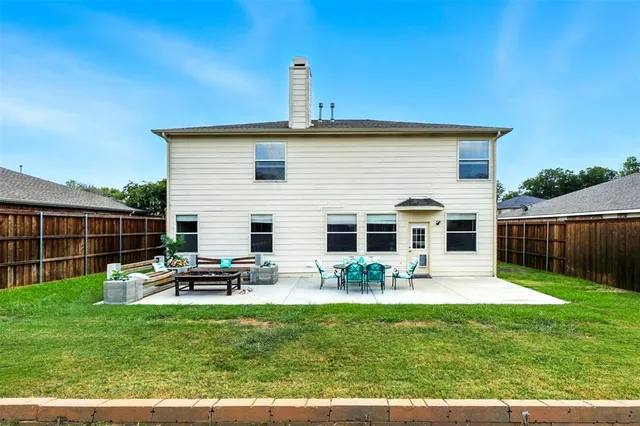 a front view of house with patio