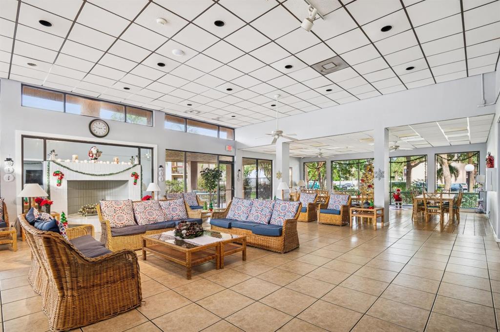 2249 Southwest 15th Street, Unit 185 Deerfield Beach, FL 33442 - Photo 20 of 31 a living room with furniture and a large window