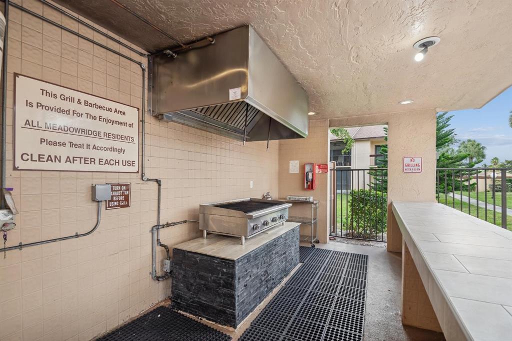 2249 Southwest 15th Street, Unit 185 Deerfield Beach, FL 33442 - Photo 21 of 31 a utility room with washer and dryer