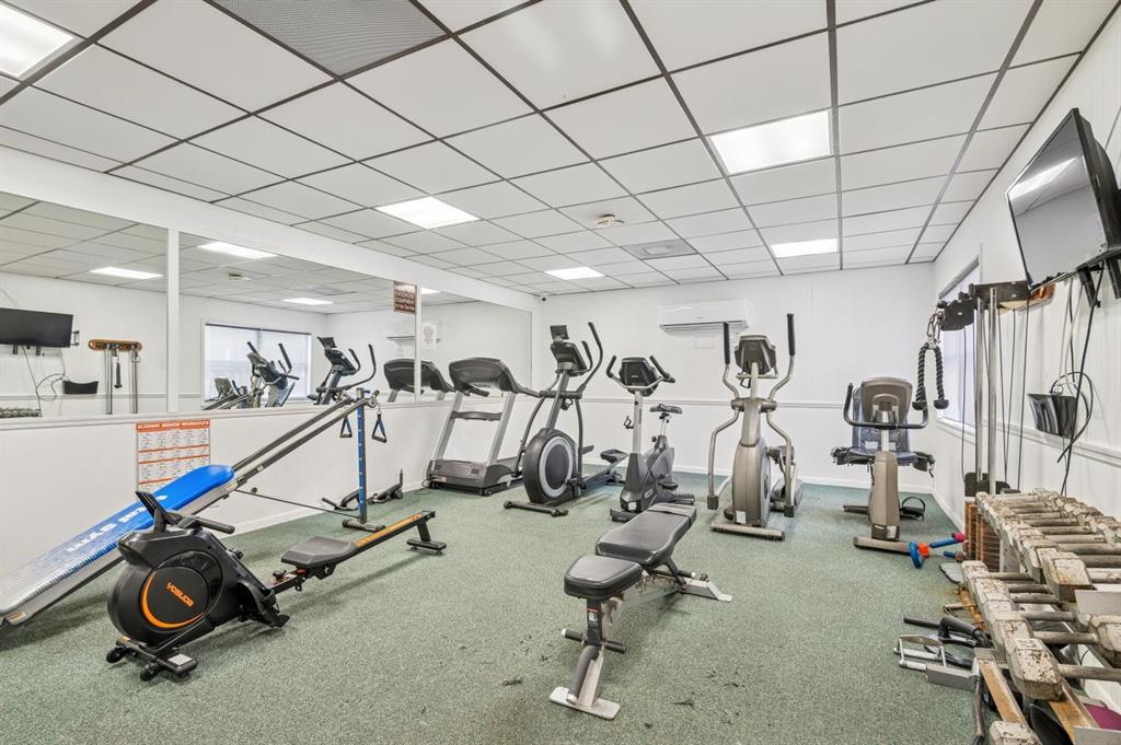 2249 Southwest 15th Street, Unit 185 Deerfield Beach, FL 33442 - Photo 22 of 31 a view of a room with gym equipment