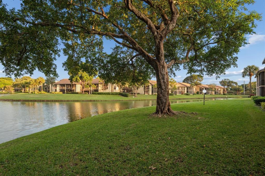 2249 Southwest 15th Street, Unit 185 Deerfield Beach, FL 33442 - Photo 23 of 31 a view of lake with houses