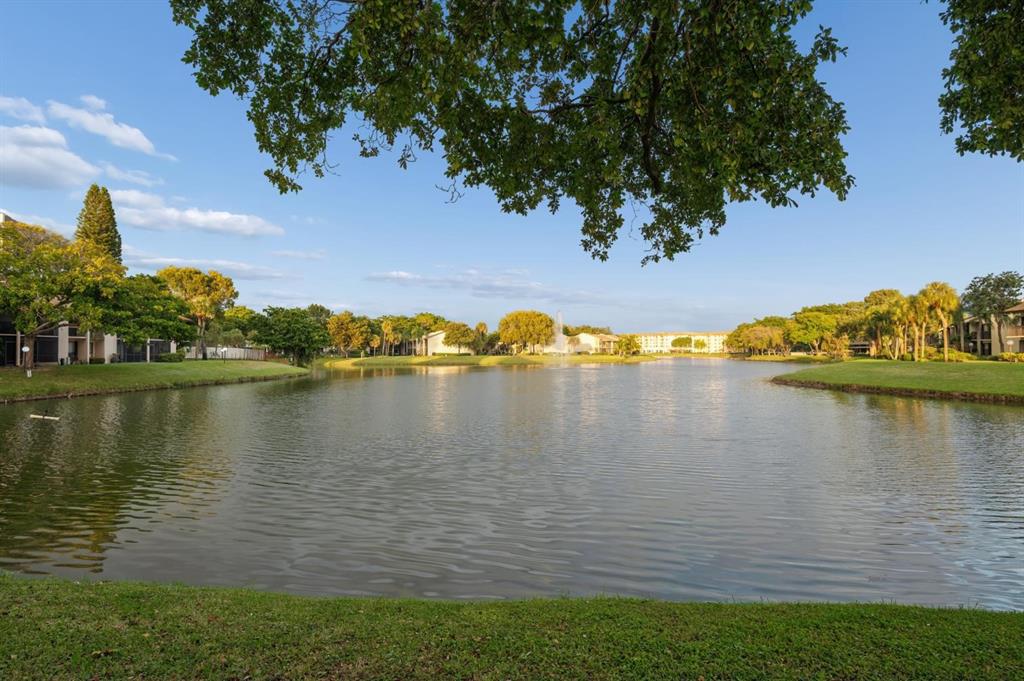 2249 Southwest 15th Street, Unit 185 Deerfield Beach, FL 33442 - Photo 24 of 31 a view of a lake with houses