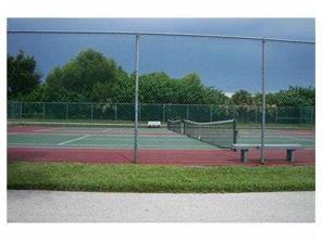 2249 Southwest 15th Street, Unit 185 Deerfield Beach, FL 33442 - Photo 28 of 31 a view of a tennis court