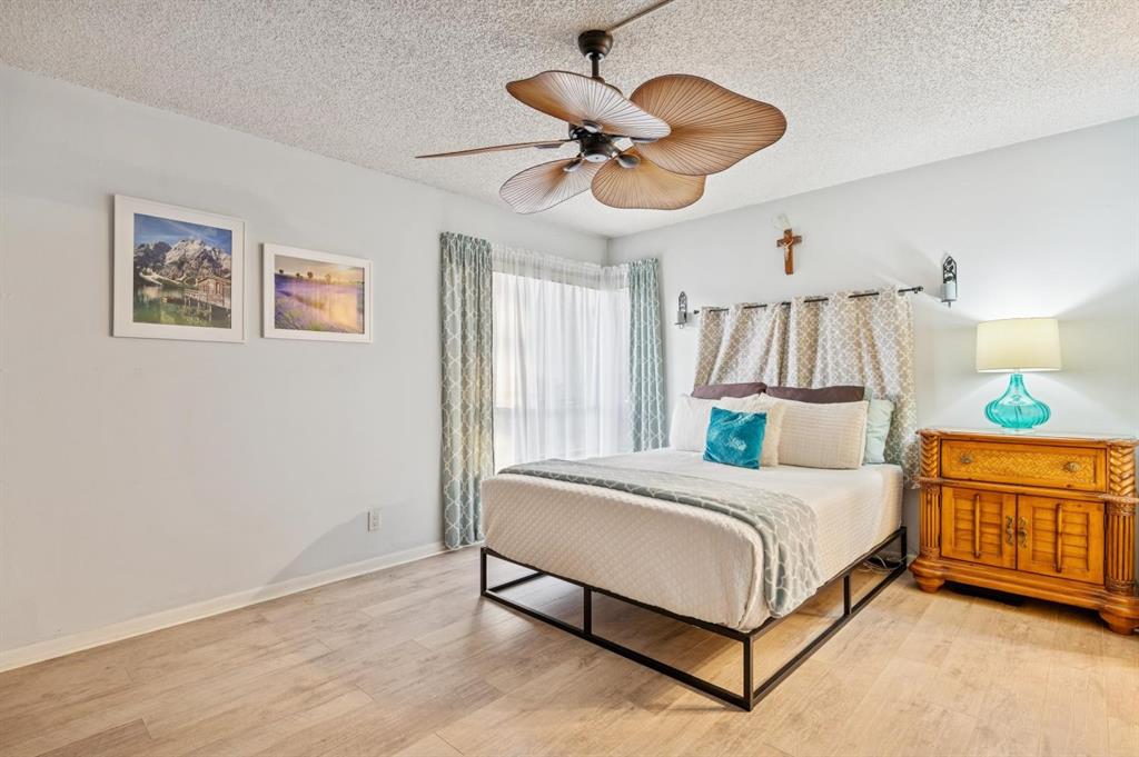 2249 Southwest 15th Street, Unit 185 Deerfield Beach, FL 33442 - Photo 8 of 31 a bedroom with a bed and window