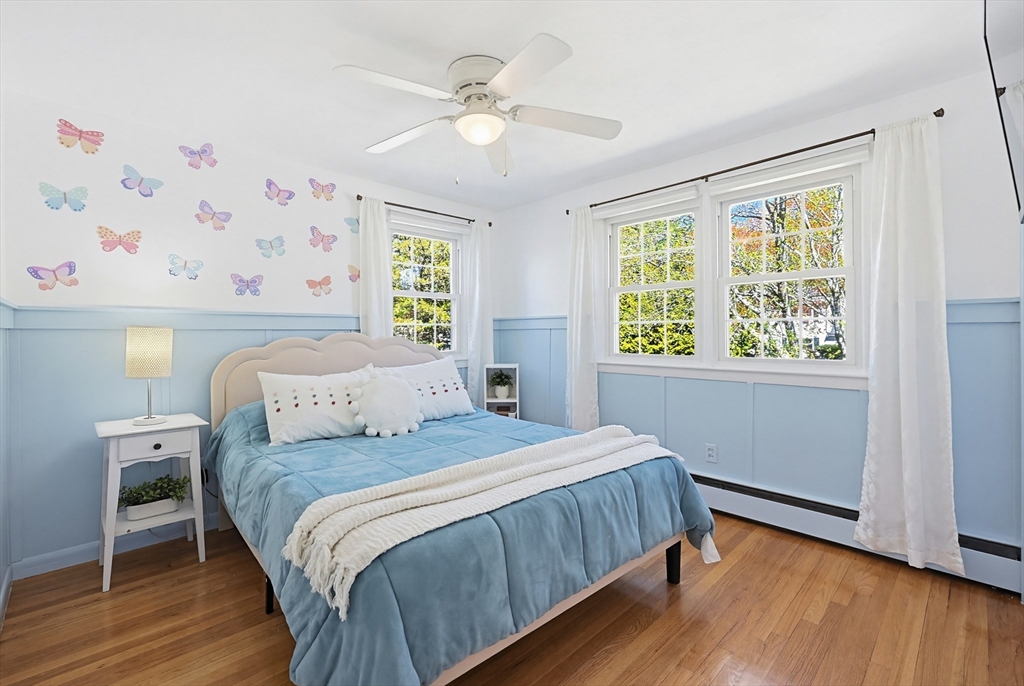 18 Anchorage Road Franklin, MA 02038 - Photo 29 of 42 a bedroom with a large bed and a window