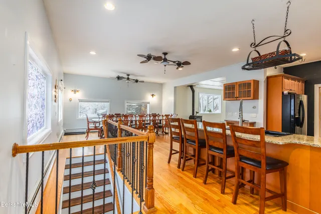 a view of a living room and dining room