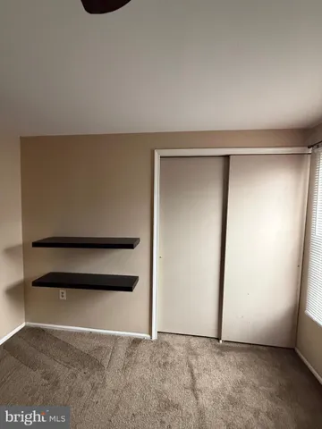 an empty room with closet