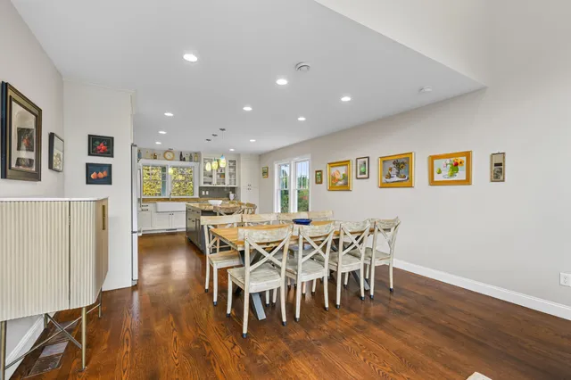 a kitchen with stainless steel appliances granite countertop a stove a refrigerator and a microwave