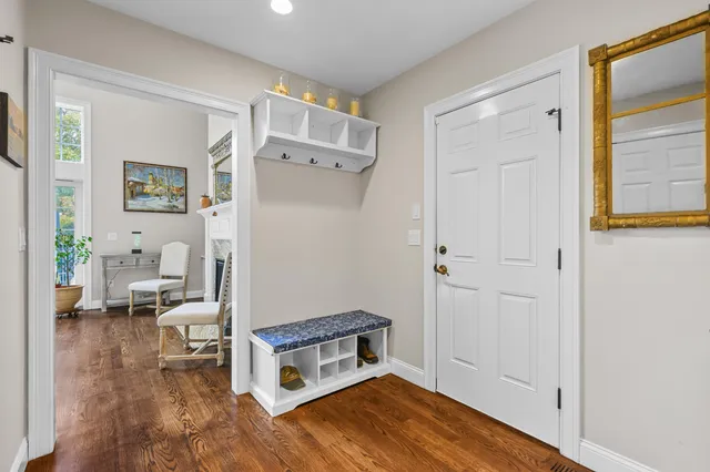 a view of entryway with wooden floor