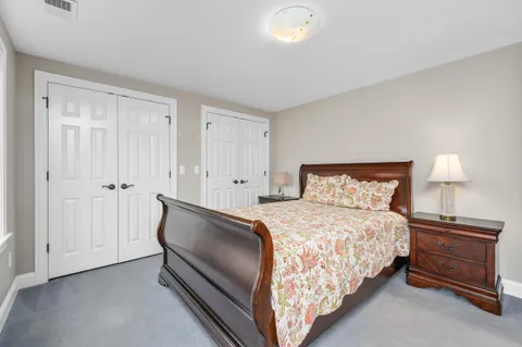 a picture of a bathroom with a shower